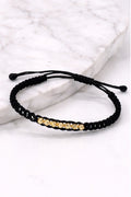Manilla Oro · Hilo negro trenzado + bolas de oro laminado 18k