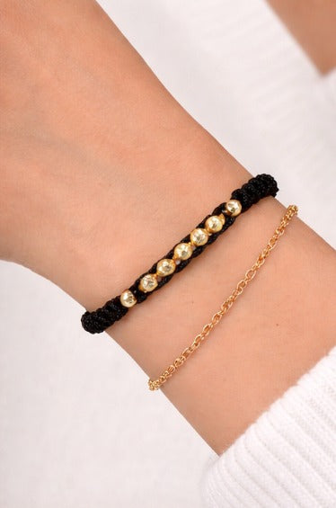 Manilla Oro · Hilo negro trenzado + bolas de oro laminado 18k
